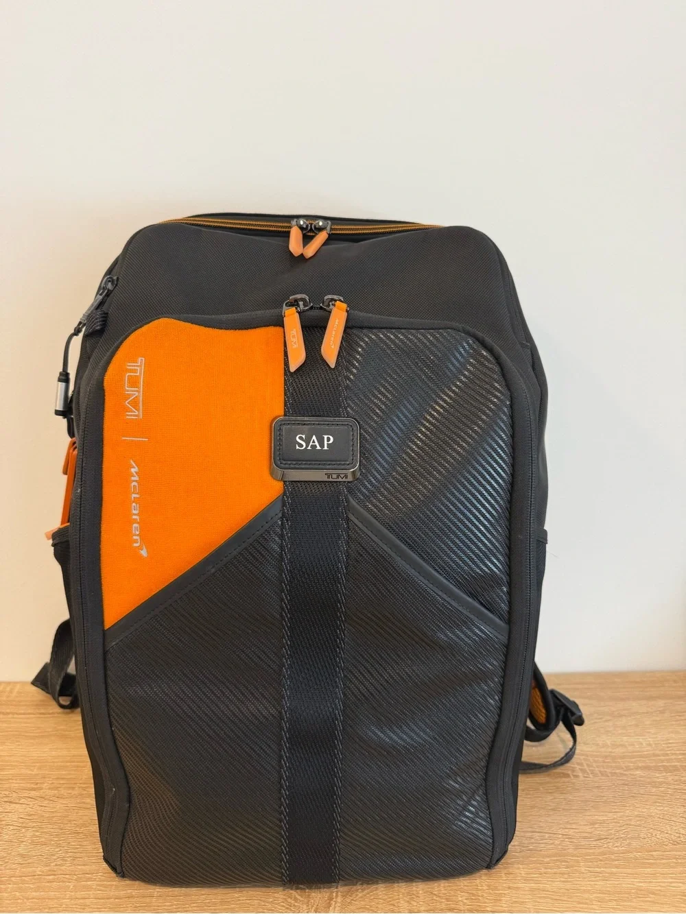 Tumi Black and Orange Men's Backpack with Detachable Travel Pouch